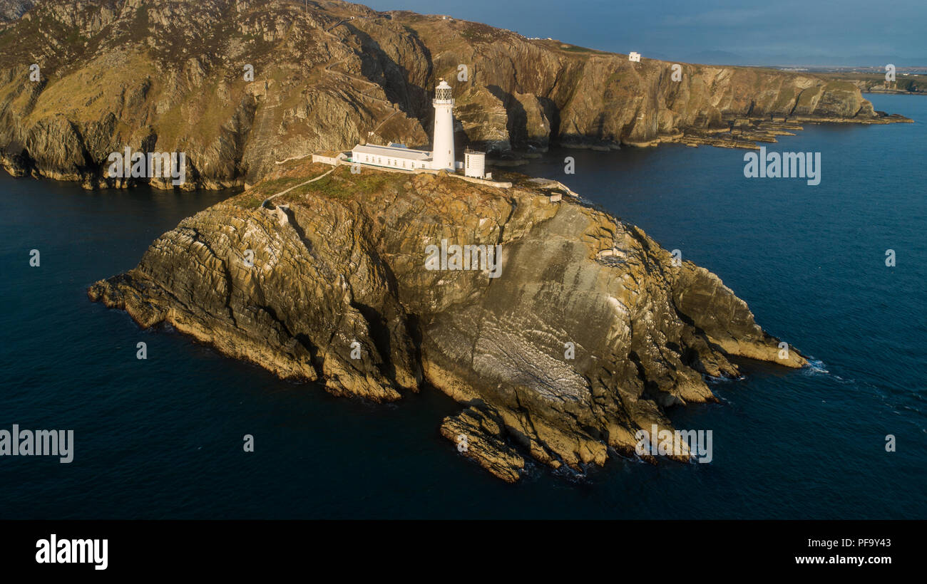 Aerial View Of South Stack Lighthouse at sunset on Anglesey, Wales, UK Stock Photo