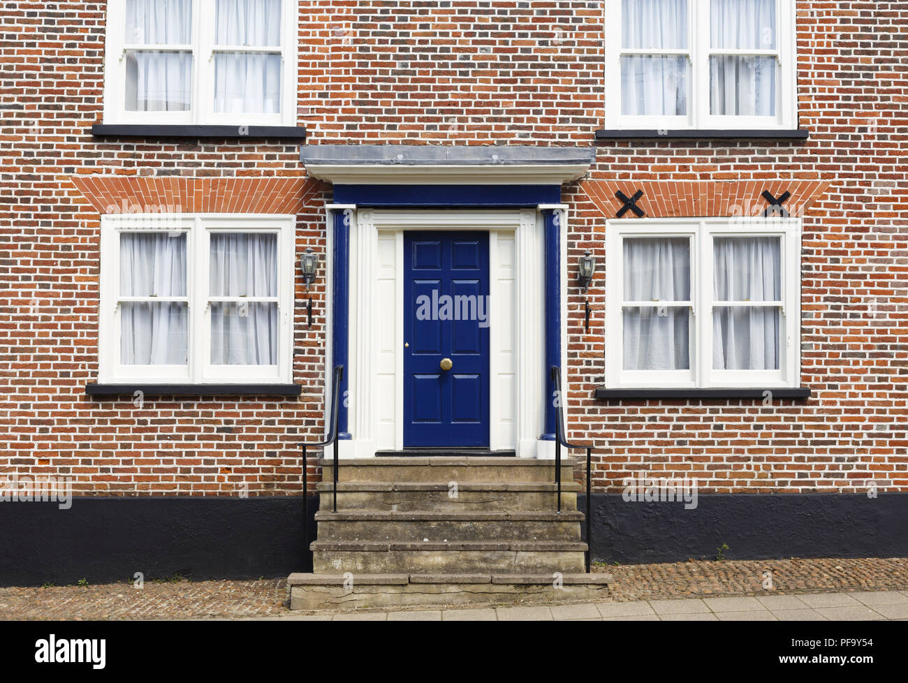 Winslow, UK - April 27, 2015. Front door of a traditional historic brick house in the UK Stock Photo