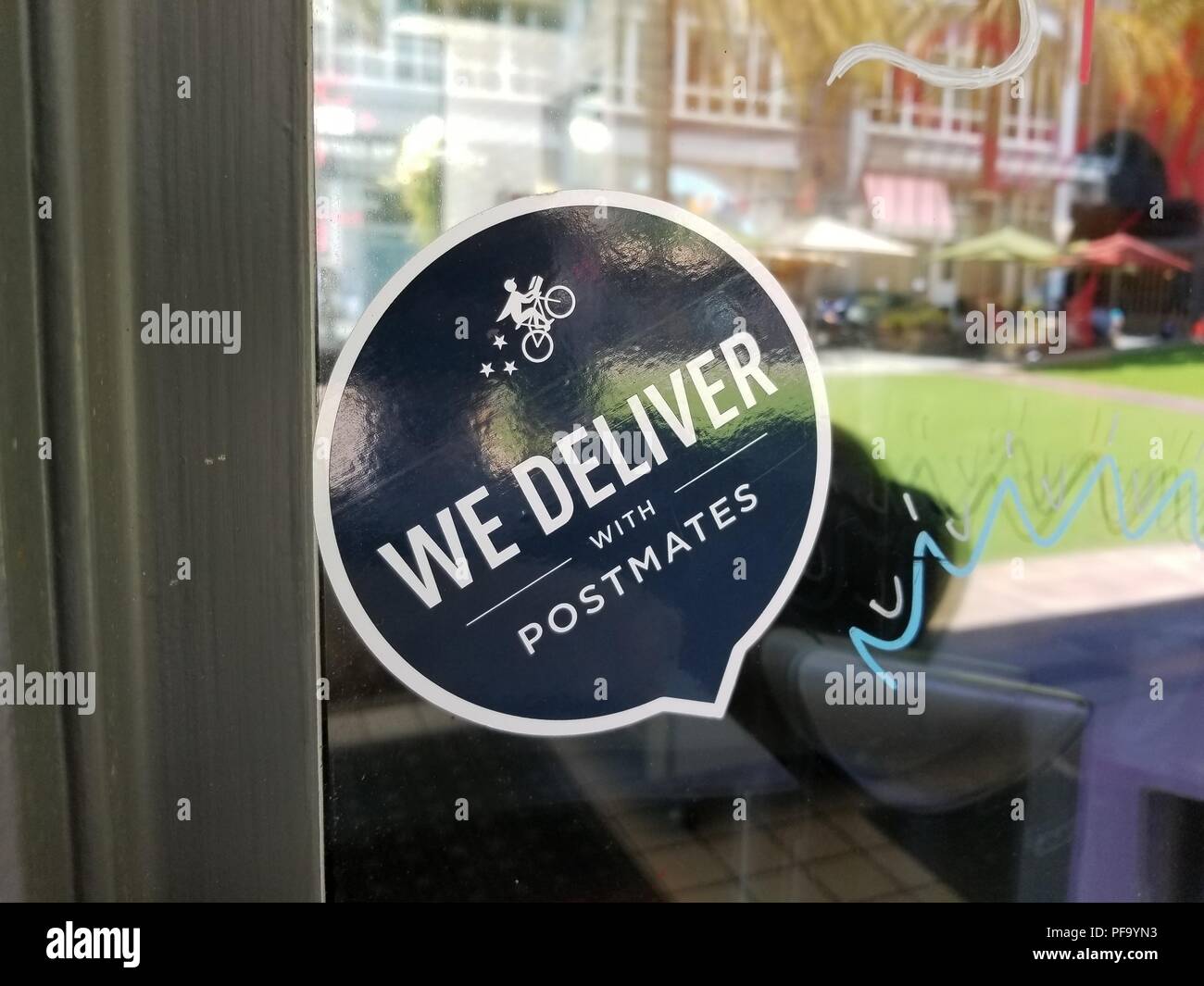 Food delivery service postmates hires stock photography and images Alamy