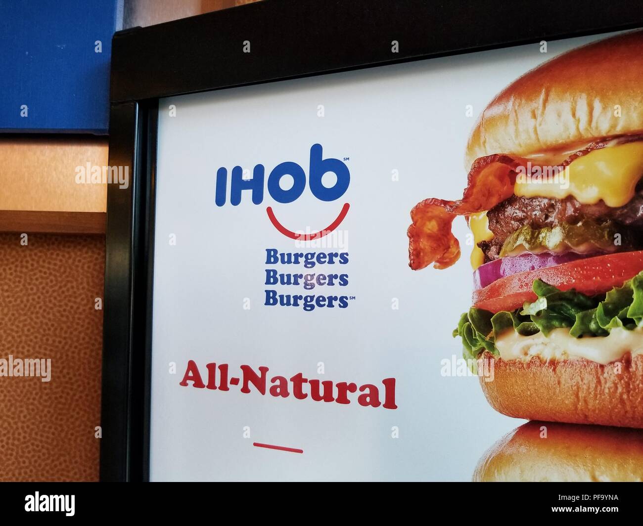 Close-up of sign with IHoB (International House of Burgers) logo, following pancake restaurant International House of Pancake's (IHoP) decision to change its name to IHoB, Dublin, California, June 20, 2018. () Stock Photo