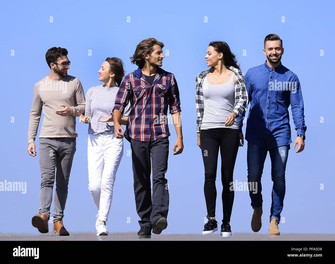 Young adults group diverse walking hi-res stock photography and images ...