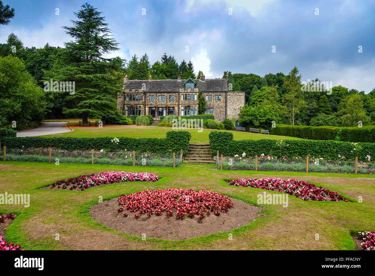 House and flowerbeds, Whirlowbrook Hall, Whirlowdale Park, Whirlow, Sheffield, South Yorkshire, England, UK Stock Photo