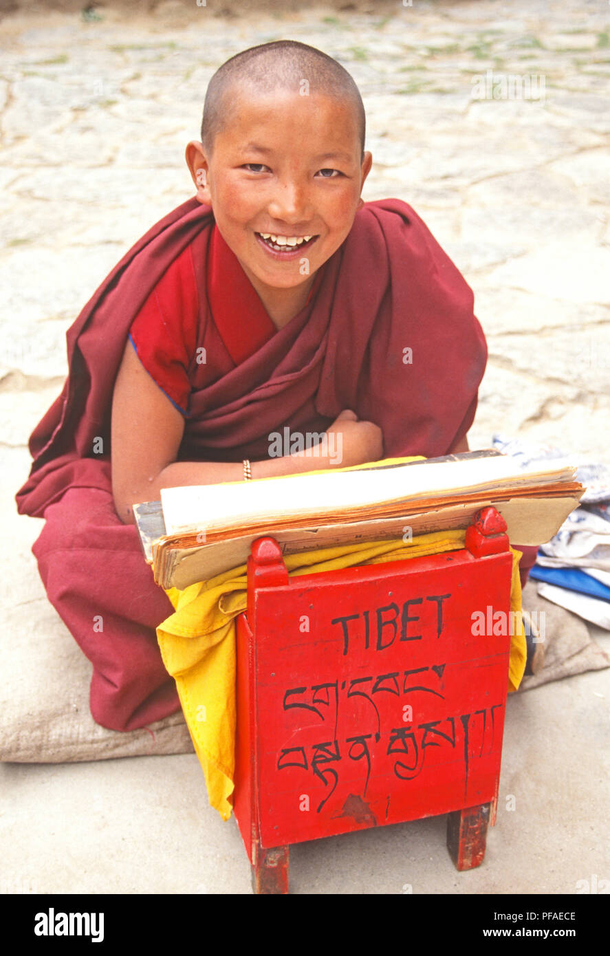 Novice monk during religious study at Drepung Monastery near Lhasa, Tibet. Stock Photo