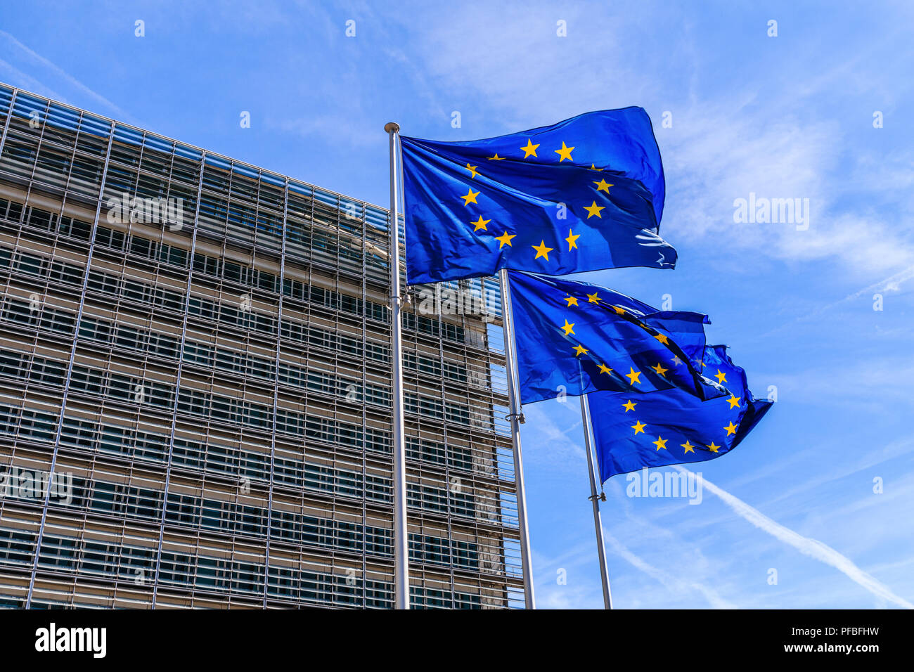 Brussels, Belgium - August 11, 2018: Flags of the European Union in front of the Berlaymont building in Brussels. Stock Photo