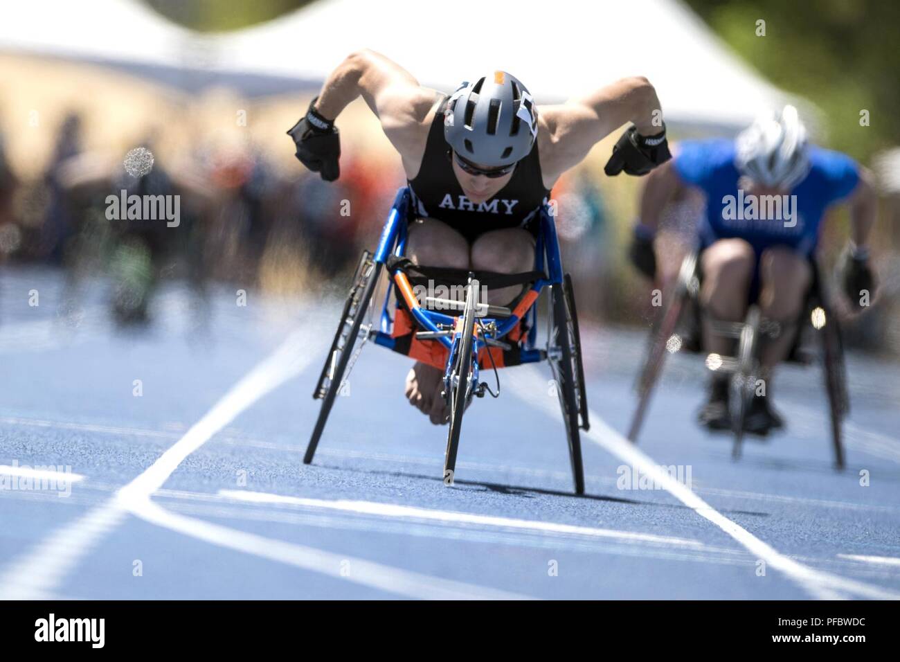 Team Army Sgt. John Weasner finishes a wheelchair race during the 2018