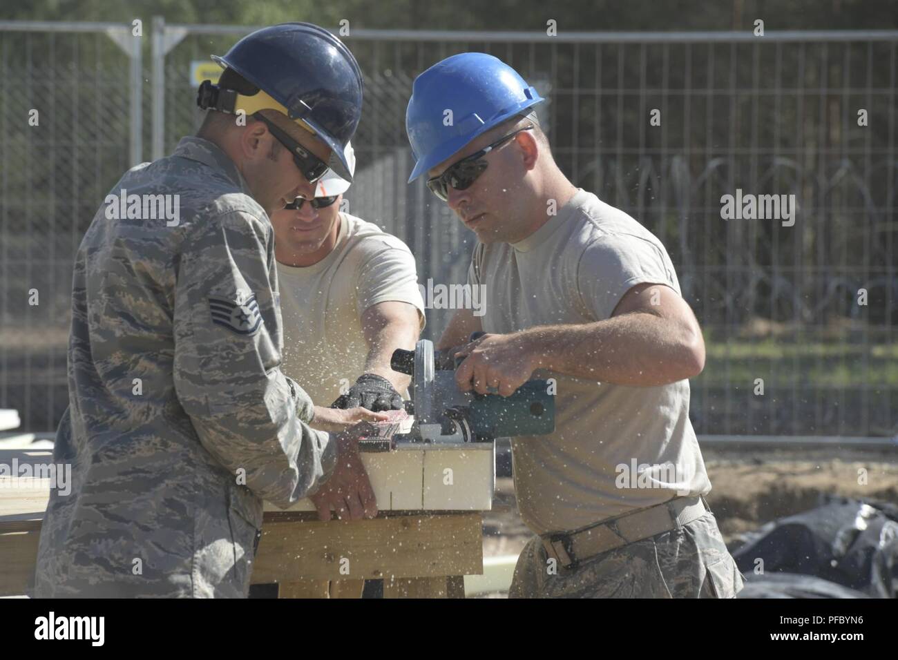 Staff Sgt. Nicholas Wright, and Tech. Sgt. Matthew Denboer, 110th