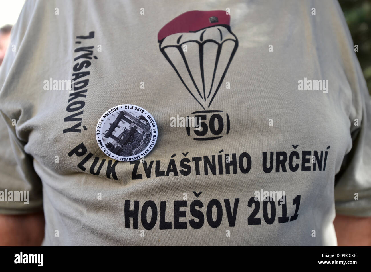 Holesov, Czech Republic. 21st Aug, 2018. A meeting of members of 7th Parachute Regiment of Special Purpose, who in August 1968 refused to hand over their barracks to soldiers of the Warsaw Pact - Soviet Guardian Tank Battalion, took place in Holesov, Czech Republic, on August 21, 2018. It was a very rare act at the time. On the photo is seen a button and t-shirt with sign reads '7th Parachute Regiment of Special Purpose'. Credit: Dalibor Gluck/CTK Photo/Alamy Live News Stock Photo