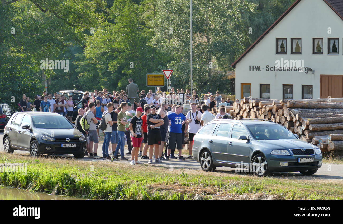 Emskirchen, Germany. 20th Aug, 2018. Participants of a hate-demo against the youtuber 'Dragonlord'. Despite a ban on meetings, several hundred people attended the demonstration. In the social media, mostly anonymous users had called for the event against the youtuber on Monday. Between the man who has been publishing videos about his life for several years and his opponents there is always a dispute. Credit: David Oßwald/NEWS5/dpa/Alamy Live News Stock Photo
