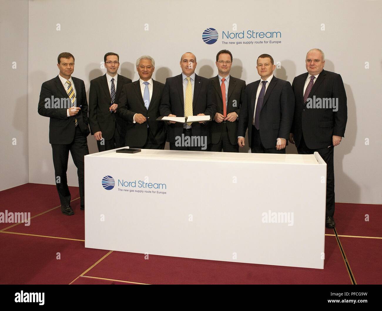 Russia. 21st Aug, 2018. Financing for the Nord Stream project is secured. Today, the company together with its shareholders in the consortium announced the successful signing of Phase II financing of the pipeline project. The project financing for Phase II amounts to 2.5 billion euros. From right to left: Matthias Warnig (Managing Director Nord Stream AG), Andrey Kruglov (Deputy Chairman of the Management Committee and Head of the Department for Finance and Economics Gazprom), Dr. Thomas Knig (Member of the Board of Management Credit: Nord Stream Ag/Russian Look/ZUMA Wire/Alamy Live News Stock Photo