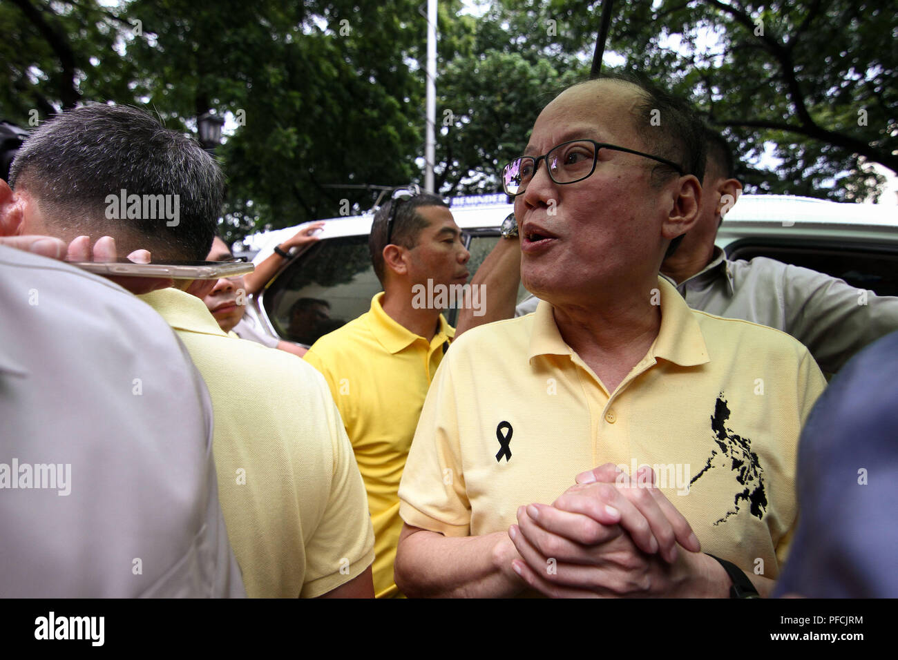 Philippines. 21st Aug, 2018. Former president Benigno Aquino III answers questions from the media after the mass commemorating the 35th year anniversary of his father's assassination. Benigno ''Ninoy'' Aquino Jr. was assassinated on August 21, 1983 while going down the staircase of a plane at the Manila International Airport. Credit: J Gerard Seguia/ZUMA Wire/Alamy Live News Stock Photo