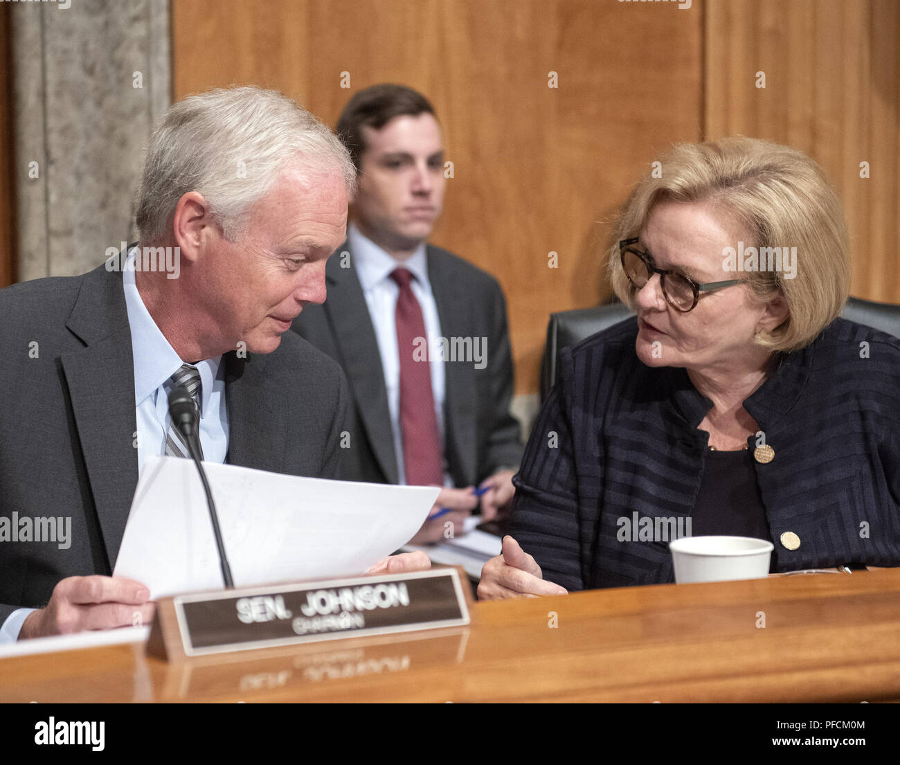 Washington, District of Columbia, USA. 21st Aug, 2018. United States Senator Ron Johnson, Chairman, US Senate Committee on Homeland Security & Governmental Affairs, left, and US Senator Claire McCaskill (Democrat of Missouri), ranking member, right, in discussion before hearing testimony on ''Examining CMS's Efforts to Fight Medicaid Fraud and Overpayments'' on Capitol Hill in Washington, DC on Tuesday, August 21, 2018 Credit: Ron Sachs/CNP/ZUMA Wire/Alamy Live News Stock Photo
