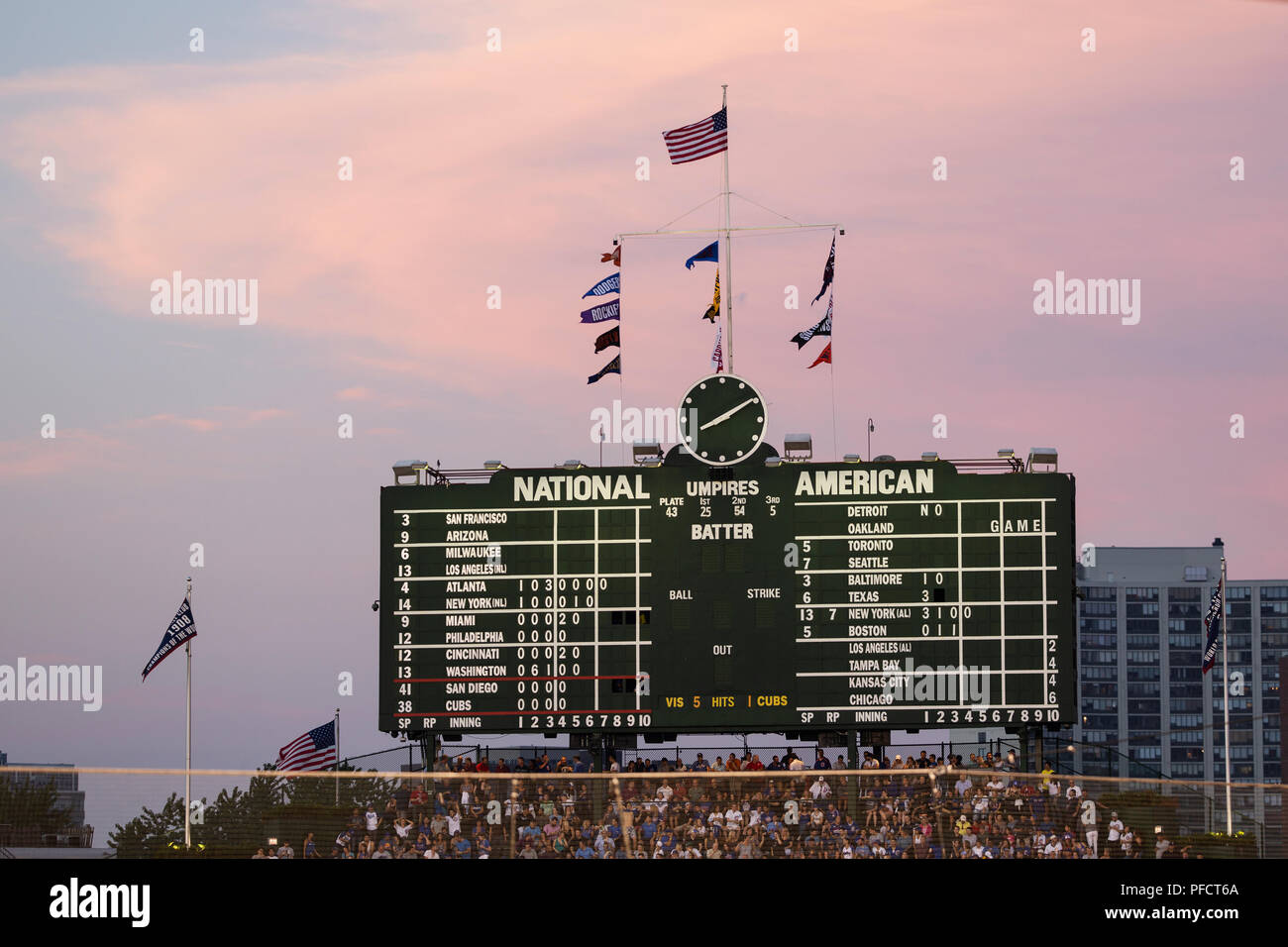 The scoreboard at sunset at Wrigley Field in Chicago, Illinois, home of the  Chicago Cubs major league baseball team Stock Photo - Alamy