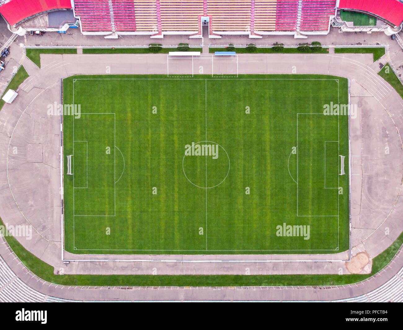 aerial top view of empty football pitch. view from above of urban stadium Stock Photo
