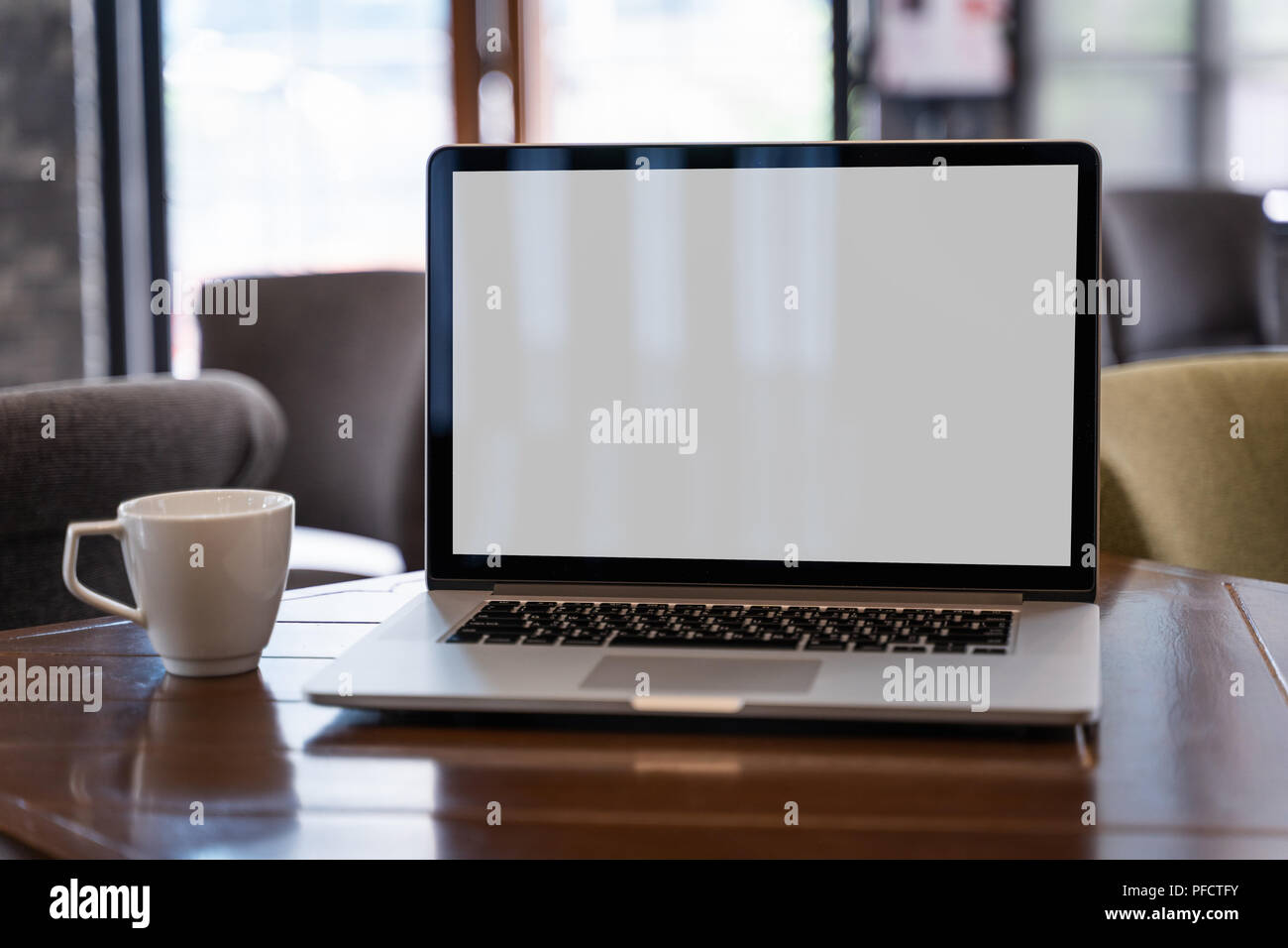 mock up Using laptop with blank screen computer modern Stock Photo