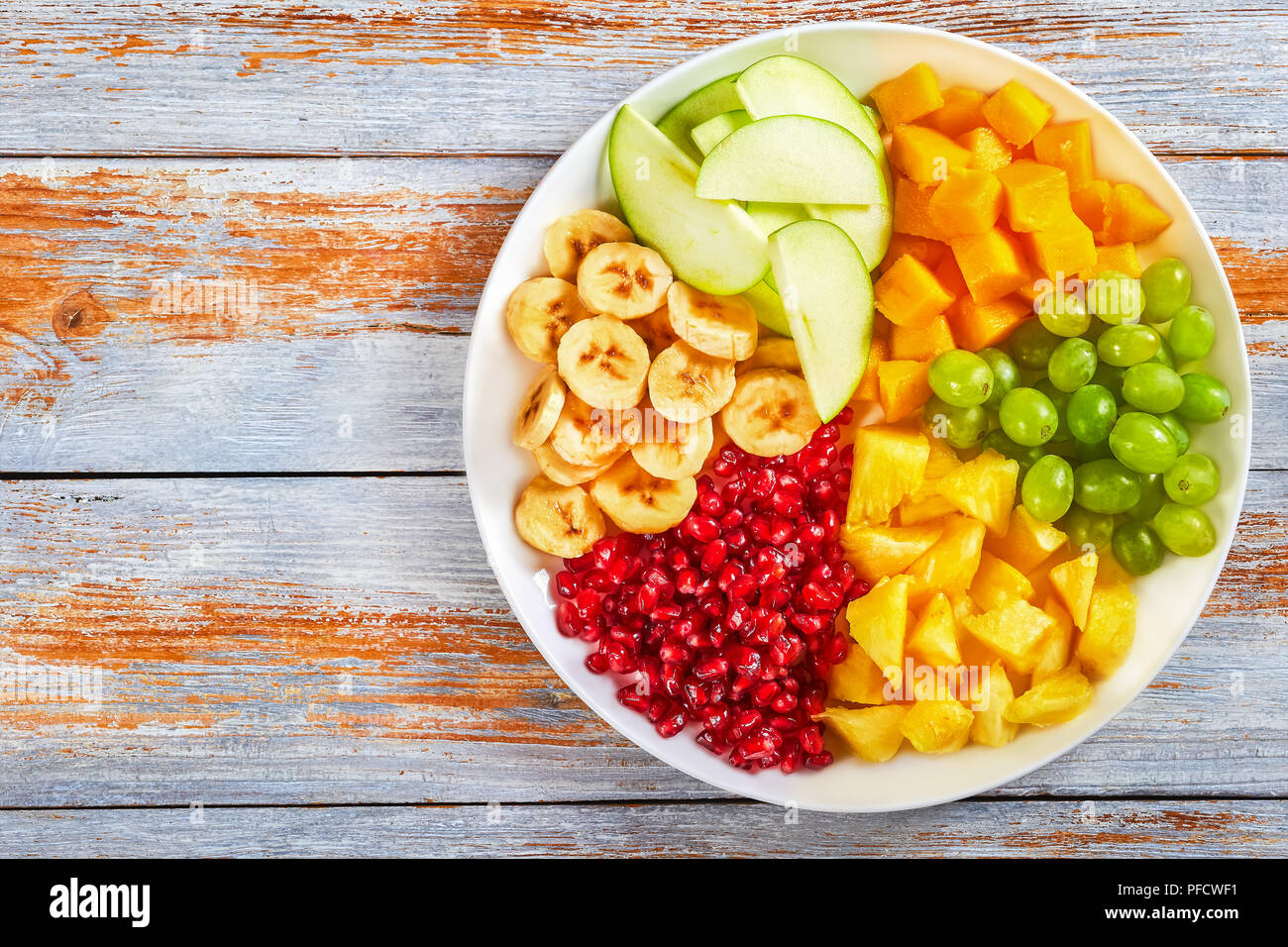 delicious colorful fruit salad set - banana, apple, mango delicious colorful fruit salad set - banana, apple, mango