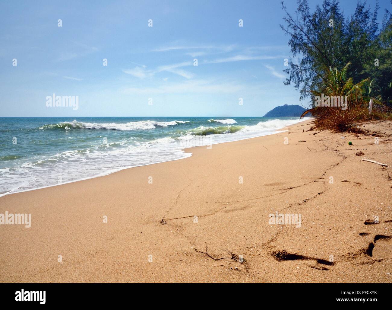 Amber sand Thang Sai Beach. Thong Chai, Bang Saphan District, Prachuap Khiri Khan province, Thailand. Stock Photo