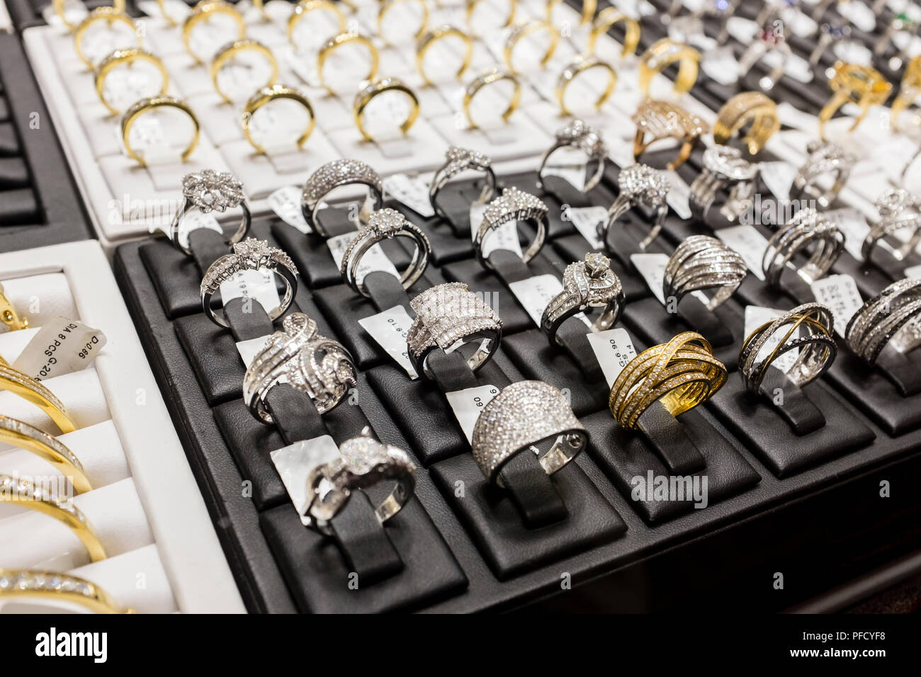 Selection of gold and platinum diamond rings for sale in the Gold Souk in  Deira, Dubai, UAE Stock Photo - Alamy