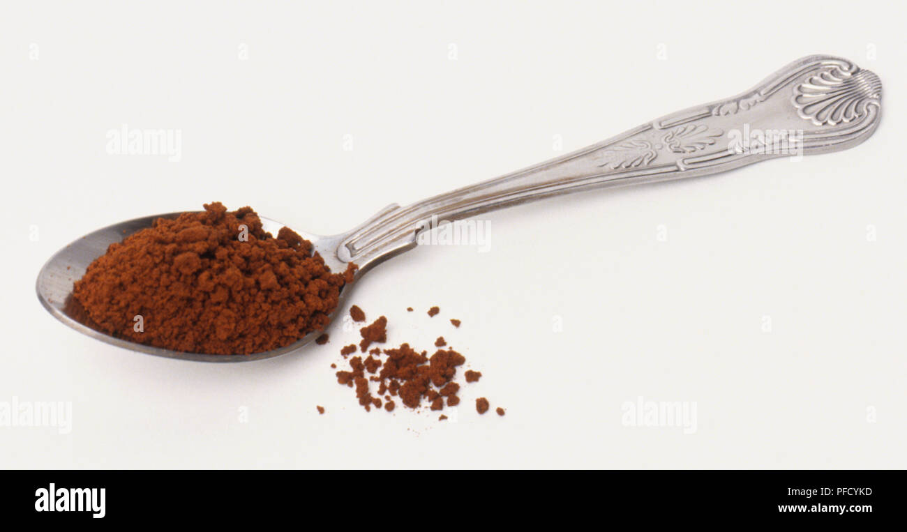 Coffee granules on a teaspoon Stock Photo Alamy