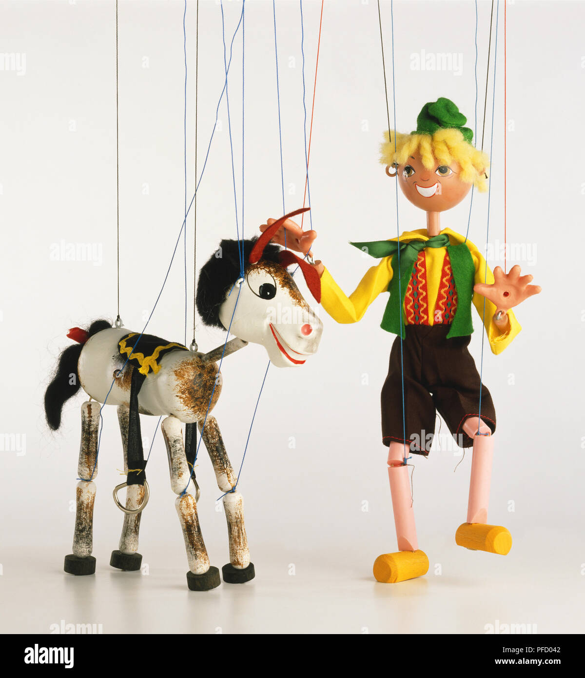 Puppets on strings hi-res stock photography and images - Alamy