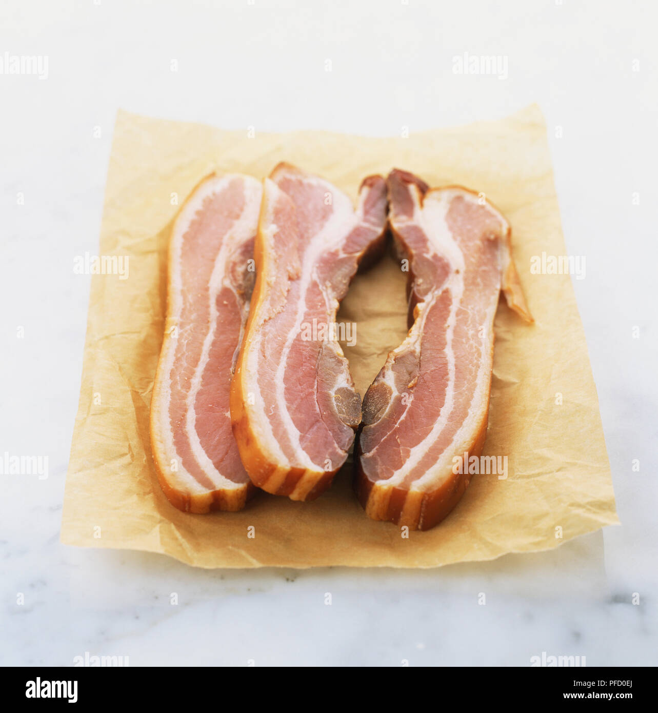 Three slices of pancetta, close up Stock Photo Alamy