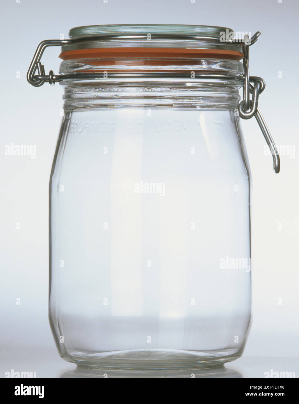 Glass jar with airtight lid, front view Stock Photo Alamy