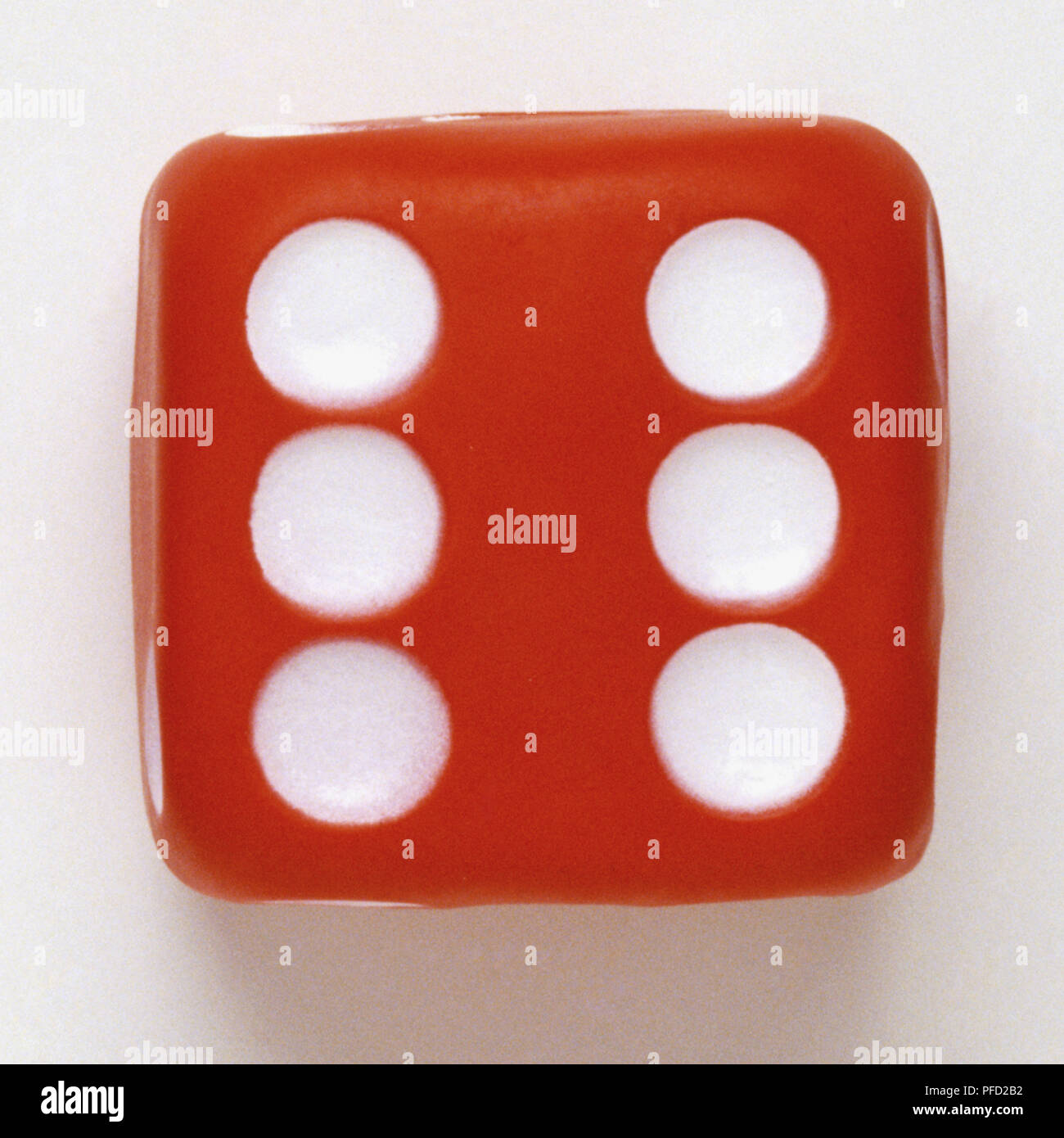Red dice with white dots, close up Stock Photo