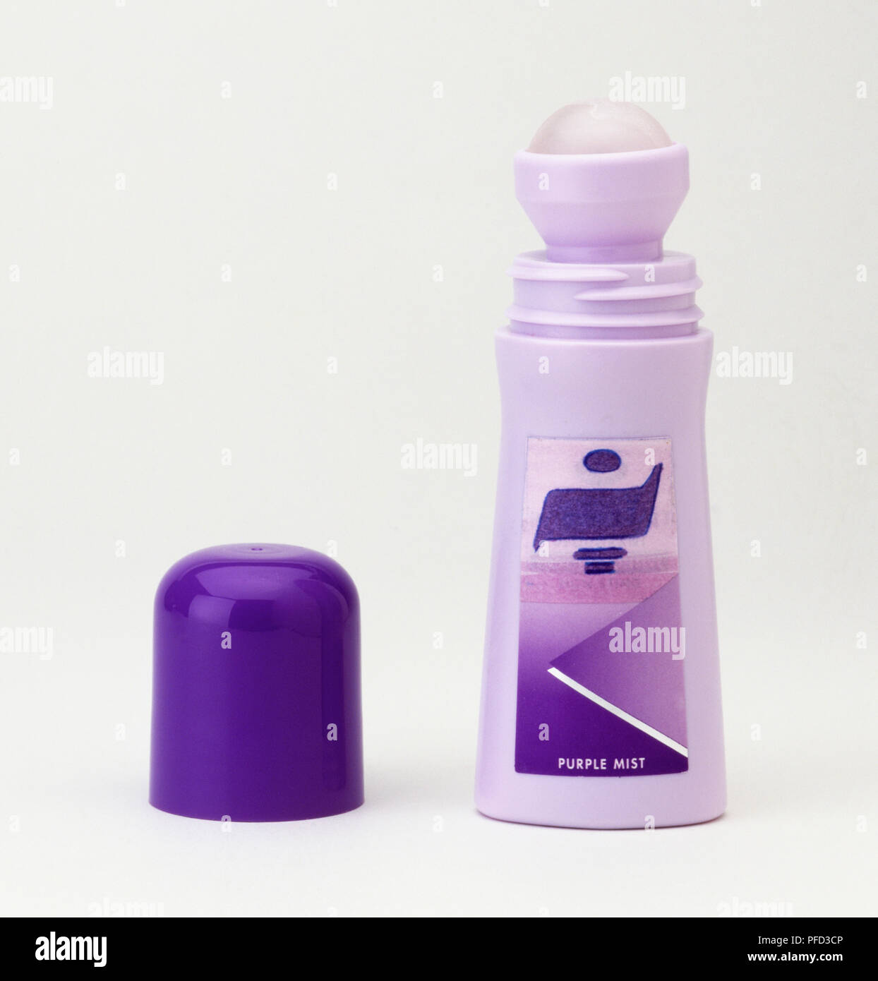 Purple bottle of roll-on deodorant with unscrewed lid on the side, close up  Stock Photo - Alamy