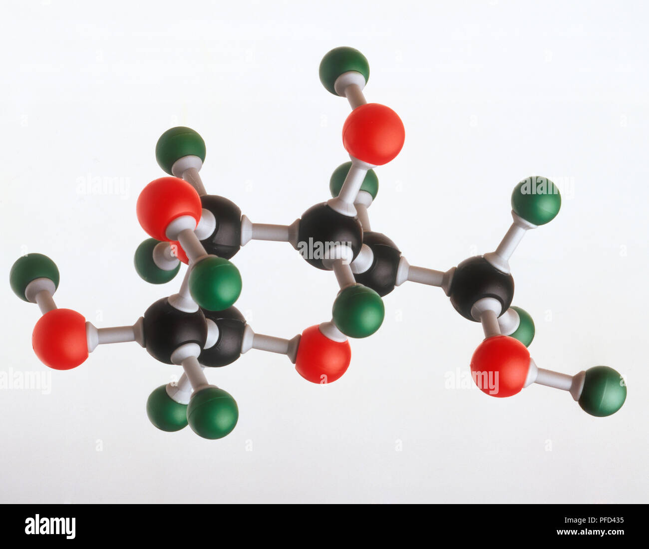 Model of a glucose molecule, showing the atomic structure of Oxygen, Carbon and Hydrogen involved in photosynthesis Stock Photo