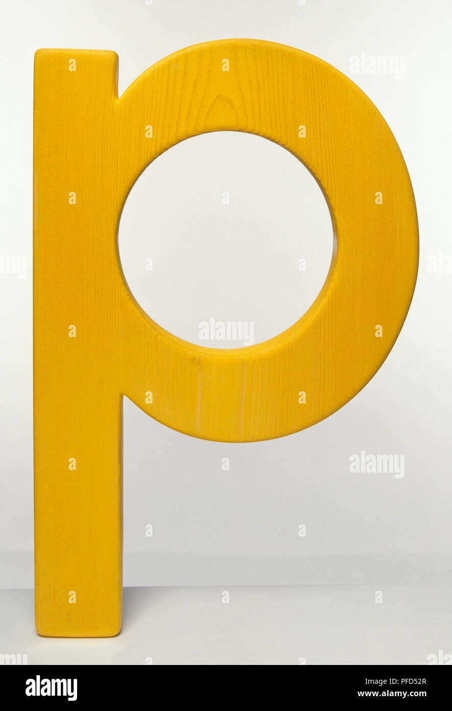 Yellow wooden letter 'p' Stock Photo