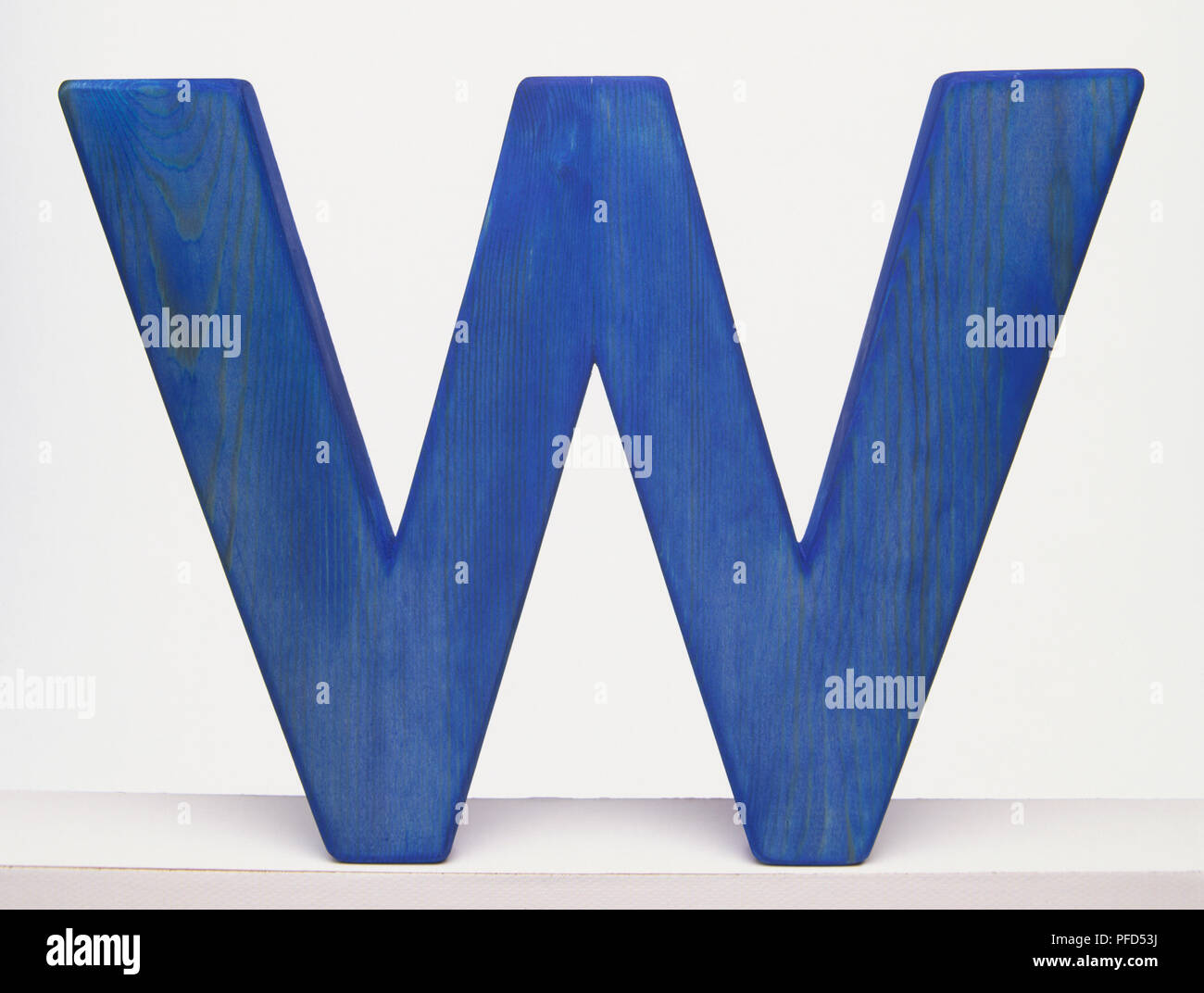 Blue wooden letter 'w' Stock Photo