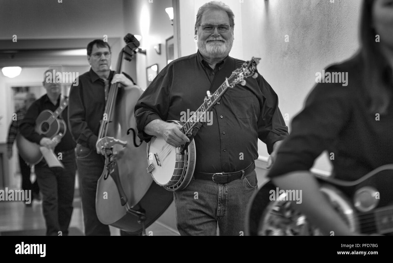 UNITED STATES - 02042017: The band Josh Grigsby and County Line head to the stage at the Lucketts School. The Lucketts school has had bluegrass music  Stock Photo