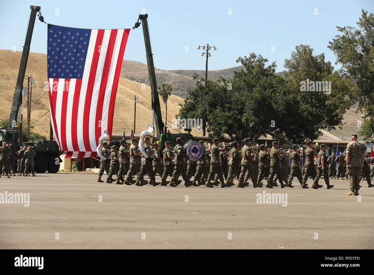 U.S. Marine Band Camp Pendleton performs during a retirement ceremony at Marine Corps Base Camp Pendleton, Calif., June 7, 2018. The ceremony was held in honor of Chief Warrant Officer 5 David C. Thomas for his 30 years of meritorious service. Stock Photo