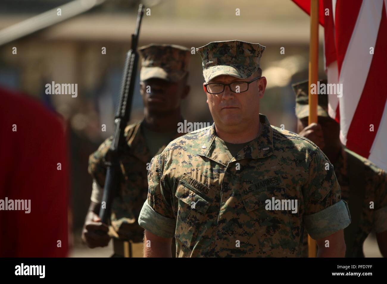 U.S. Marine Corps Chief Warrant Officer 5 David C. Thomas with Fire and Maneuver Intergration Division, Headquarters Marine Corps, stands at attention during a retirement ceremony at Marine Corps Base Camp Pendleton, Calif., June 7, 2018. The ceremony was held in honor of Thomas for his 30 years of meritorious service. Stock Photo
