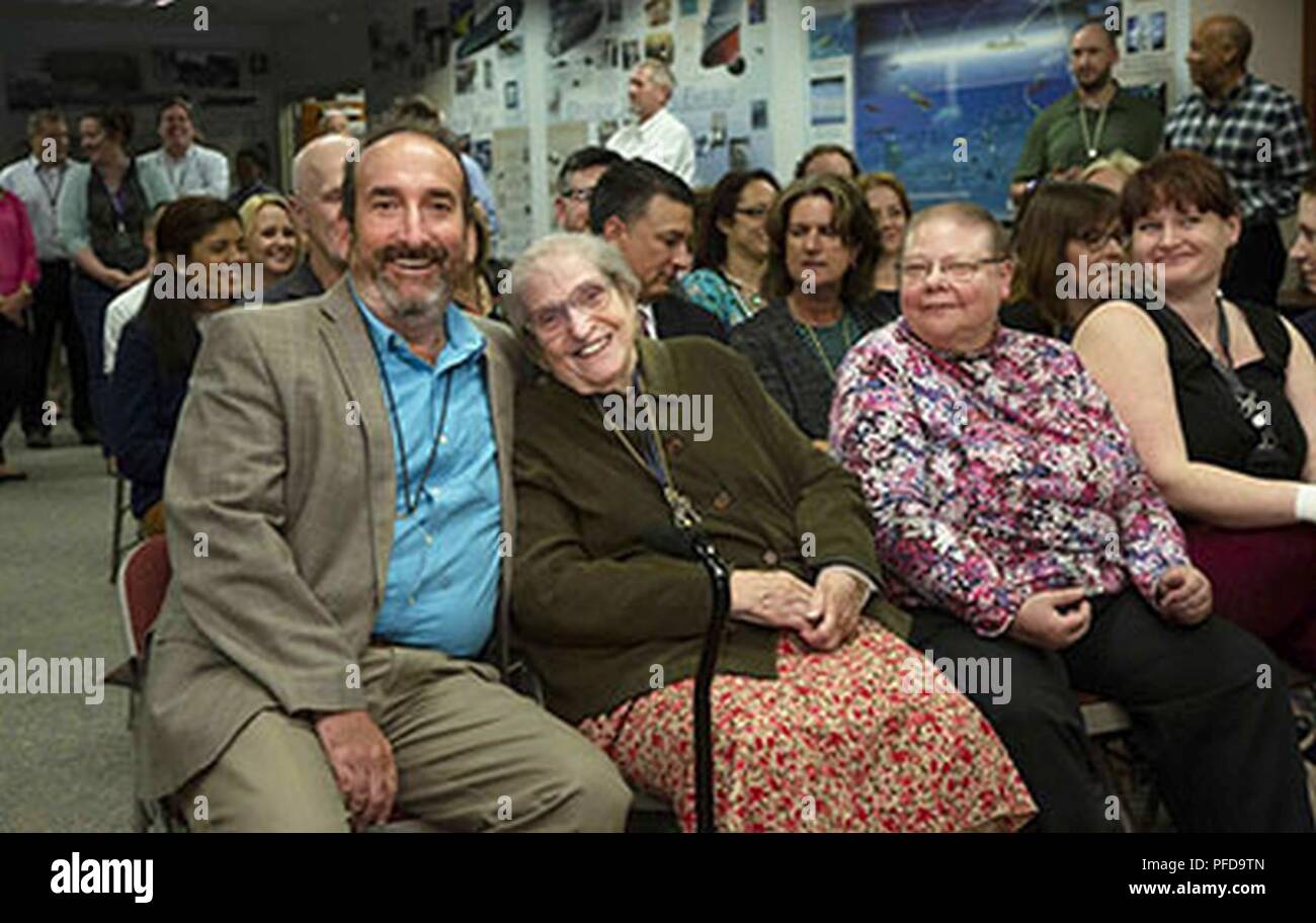 Martha Merriwether (center), was joined by Dr. Brian McKeon (from left), head, Undersea Warfare Weapons, Vehicles and Defense Systems Department, her daughter Judy Merriwether and her friend Rachel Badalyan, for a Meritorious Civilian Service Award ceremony held at NUWC Headquarters in Newport on June 7, 2018. Stock Photo