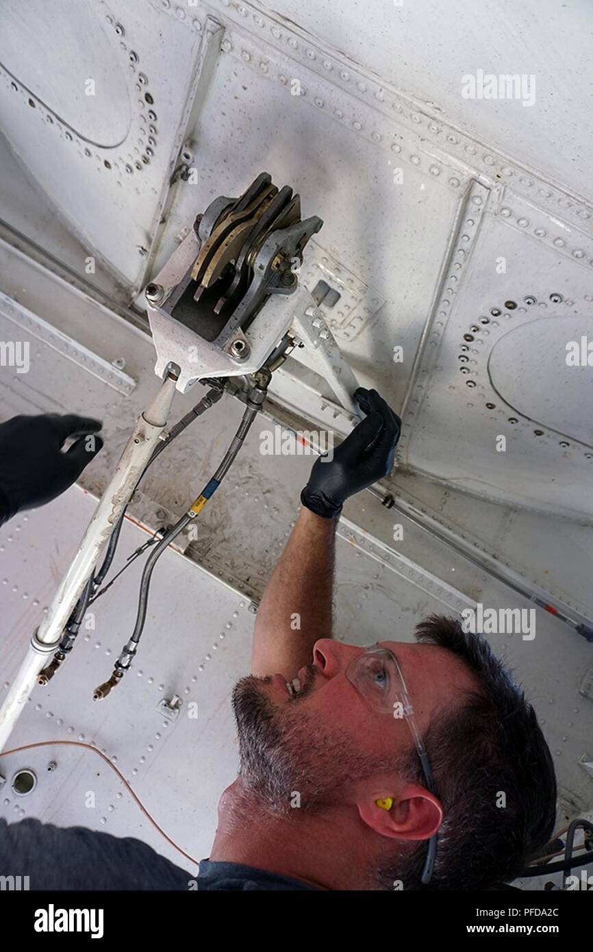 Blake Nix, 560th Aircraft Maintenance Squadron hydraulics mechanic, removes hydraulic lines from