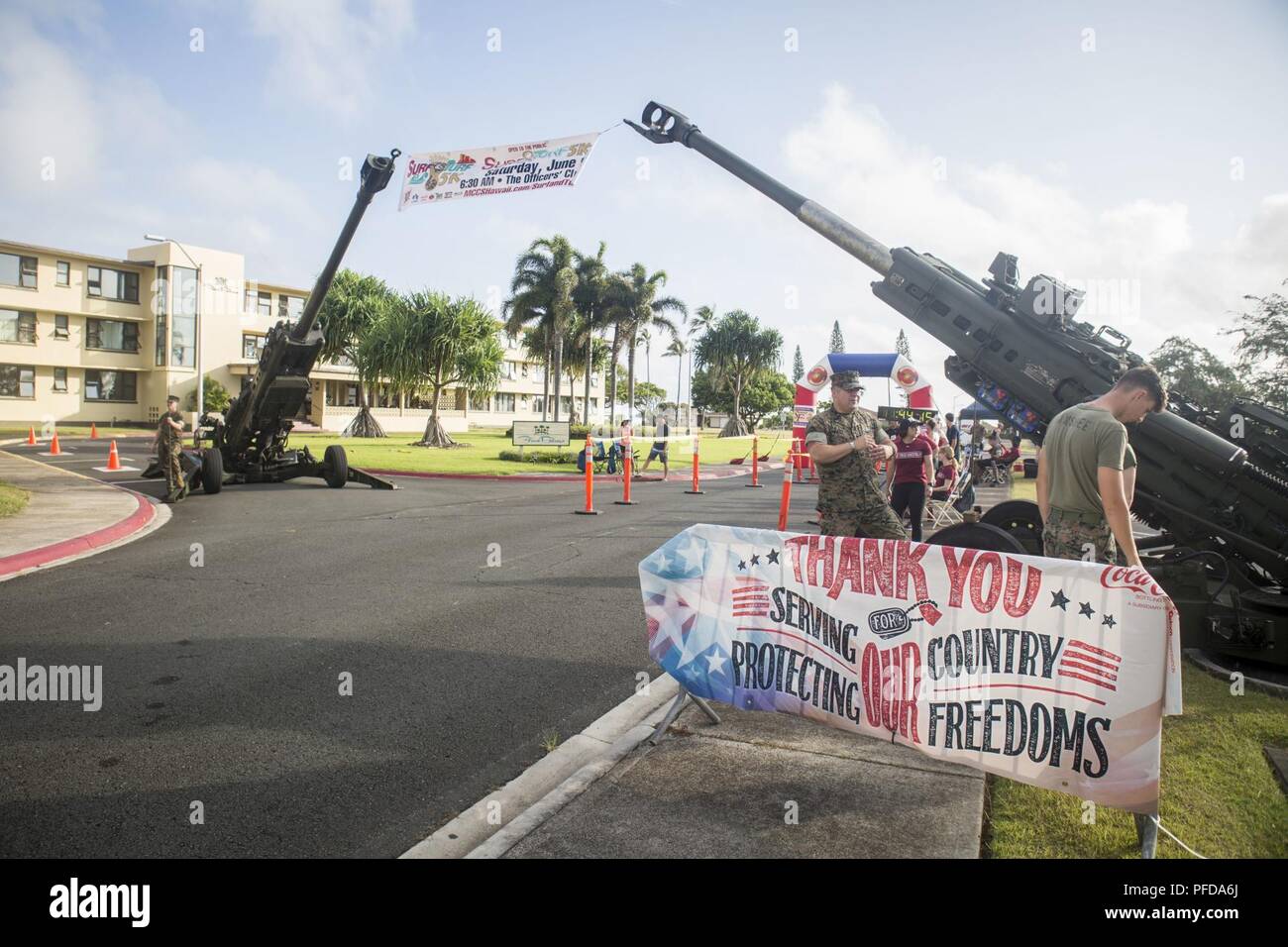 MARINE CORPS BASE HAWAII — Race participant Petty Officer 3rd Class Jessica  Treu crosses the finish line during the 12th annual Splash \u0026 Dash Biathlon  aboard Marine Corps Base Hawaii, Oct. 3,, image size:1300x956