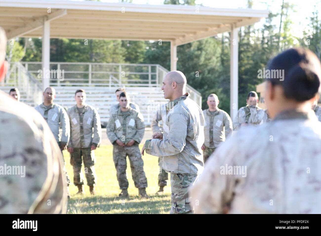 Staff Sgt. Travis Garza from 1-125th Infantry teaches Combatives to Soldiers from the 1463rd Transportation Company on Camp Grayling Joint Maneuver Training Center, June 6, 2018. The 1463rd Transportation Company out of Fort Custer, Michigan trains as one of the Michigan National Guard 4.0 units, which are aimed at increasing overall combat readiness over time through multiple organizational and cultural changes. (Michigan National Guard Stock Photo