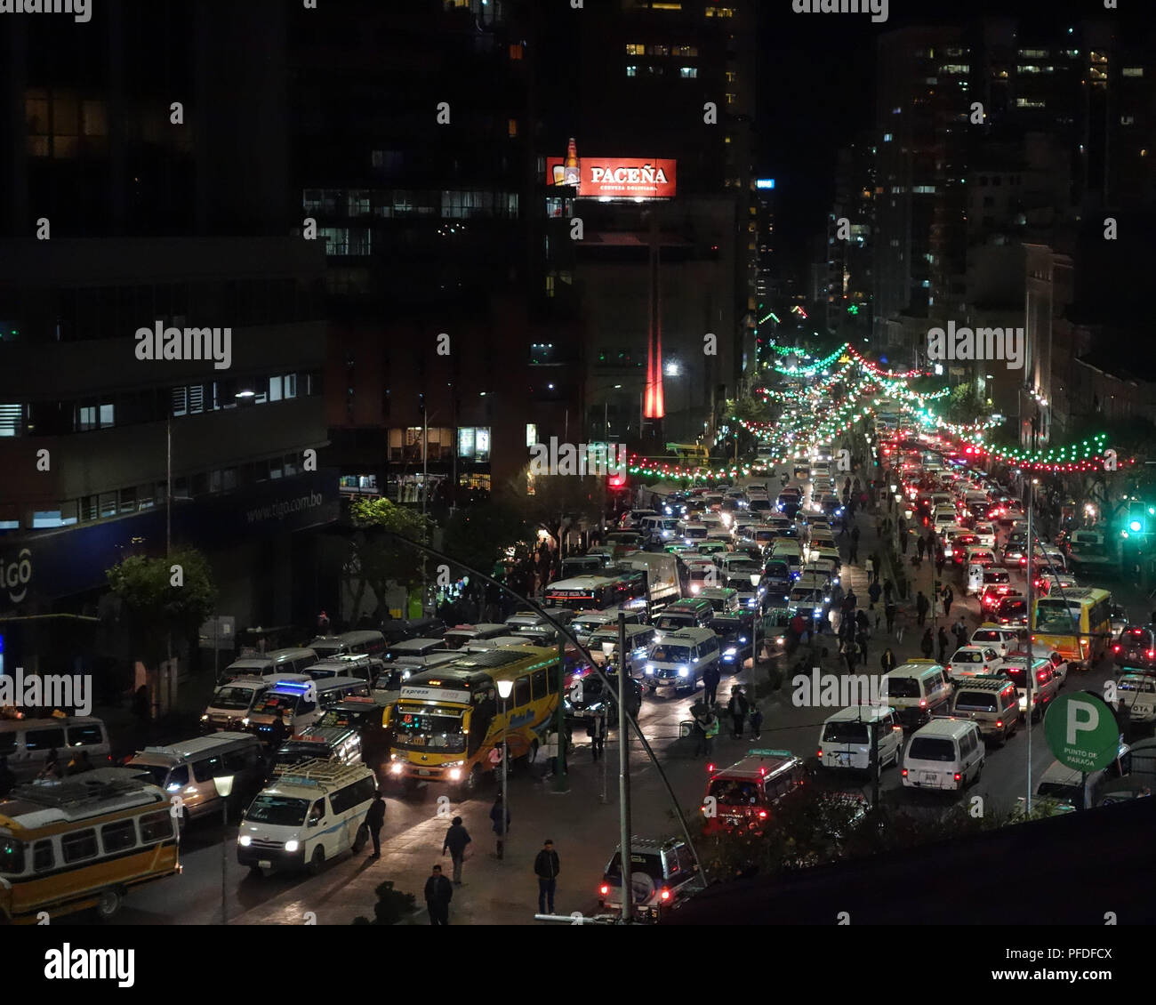 Evening view along Mariscal Santa Cruz Avenue, the main thoroughfare in downtown La Paz, Bolivia Stock Photo