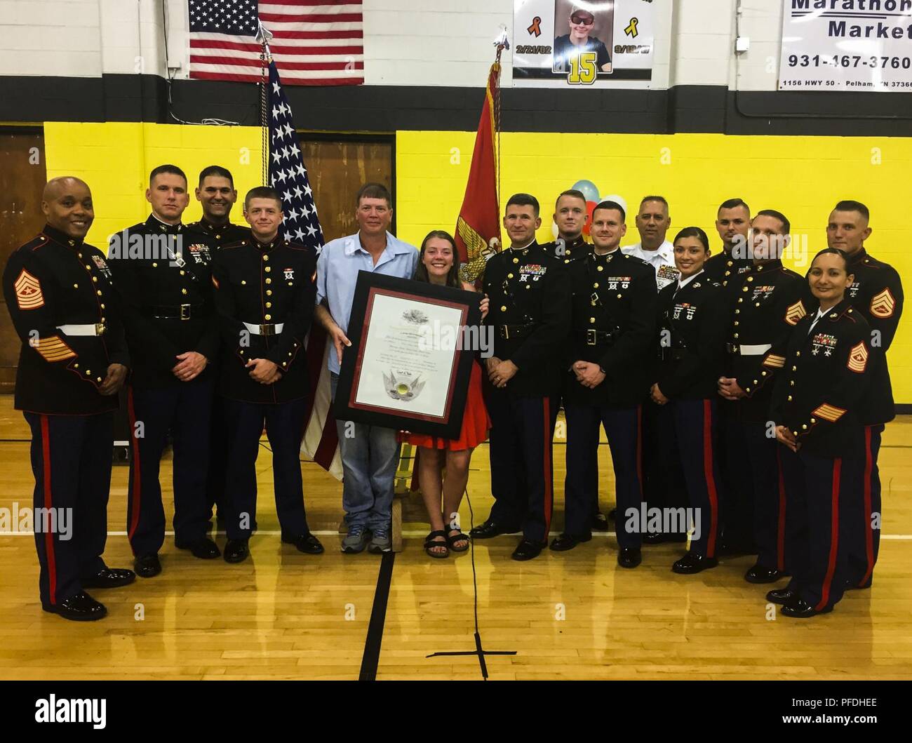 Left to right, Sgt. Maj. Cortez L. Brown, Maj. Jonathan W. Landers, Gunnery  Sgt. Isaac M. Ishak, Pfc. Gavin G. Northcutt, Marty Northcutt, Tori  Northcutt, Col. Jeffrey C. Smitherman, Staff Sgt. Brian