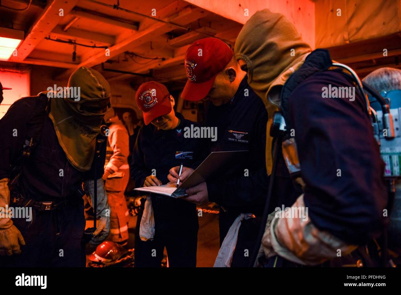(June 13, 2018) PHILLIPPINE SEA Damage control training team members ...