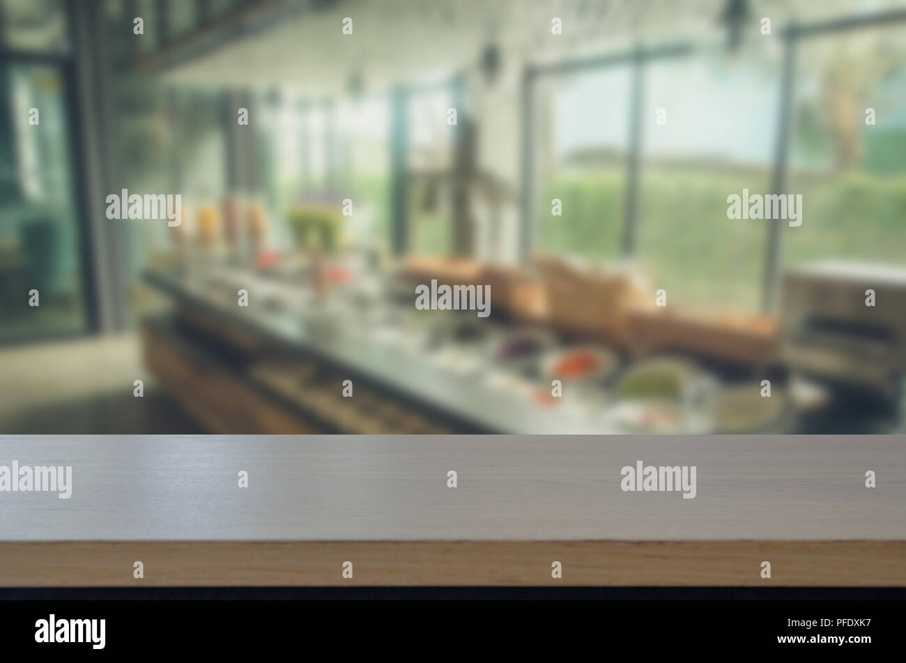 wood top table and Abstract Blurred image food bar at cafe. Can be used for display or montage your products. Stock Photo
