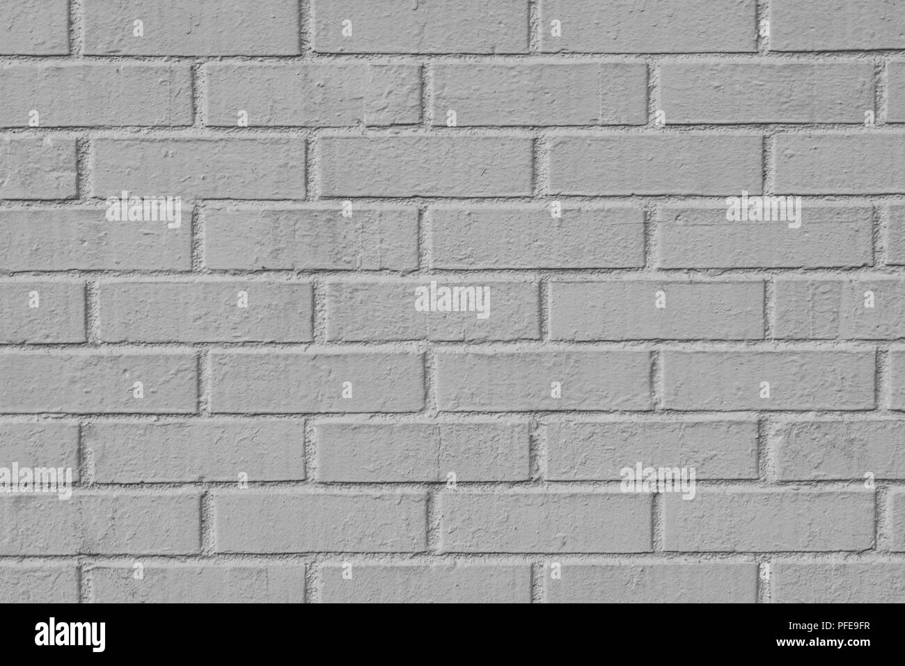 Background shot of flat grey brick wall Stock Photo - Alamy