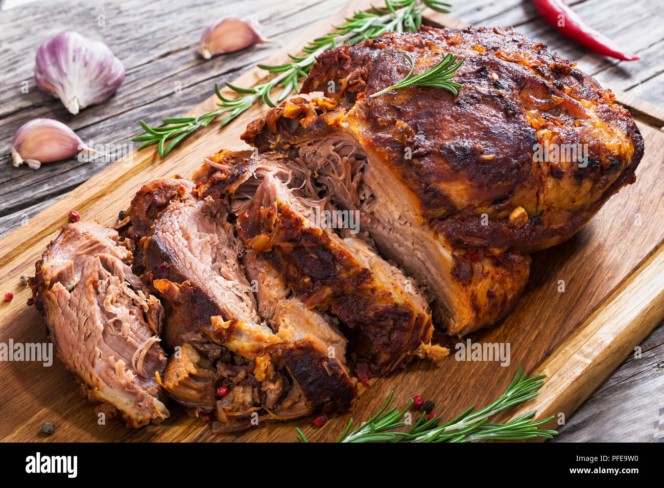 Big Piece of Slow Cooked OvenBarbecued Pulled Pork shoulder on