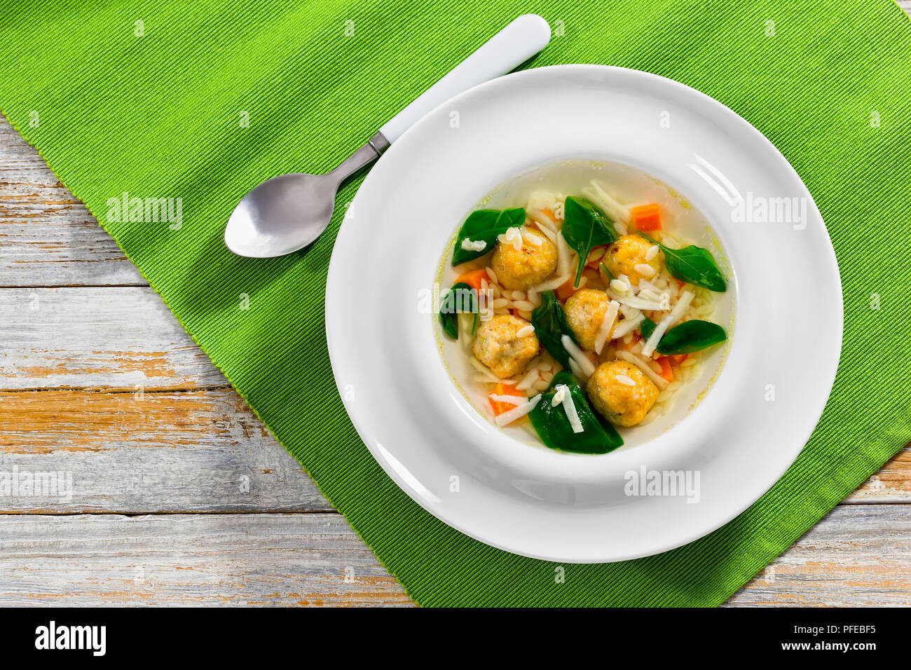 Cooking soup with meatballs and pasta Cooking soup with meatballs and pasta