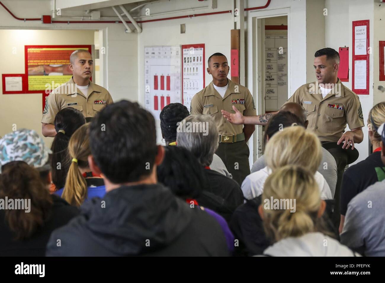 Drill instructors with Charlie Company, 1st battalion, demonstrate a mock pick up to the educators of Recruiting Station Dallas and Houston on Marine Corps Recruit Depot San Diego on June 6, 2018 during Educators' Workshop. The workshop is a four-day program designed to better inform high school and college educators about the benefits and opportunities available during service in the Marine Corps. This allows the attendees to return to their place of business and provide firsthand experience and knowledge to individuals interested in military service. (Marine Corps Stock Photo