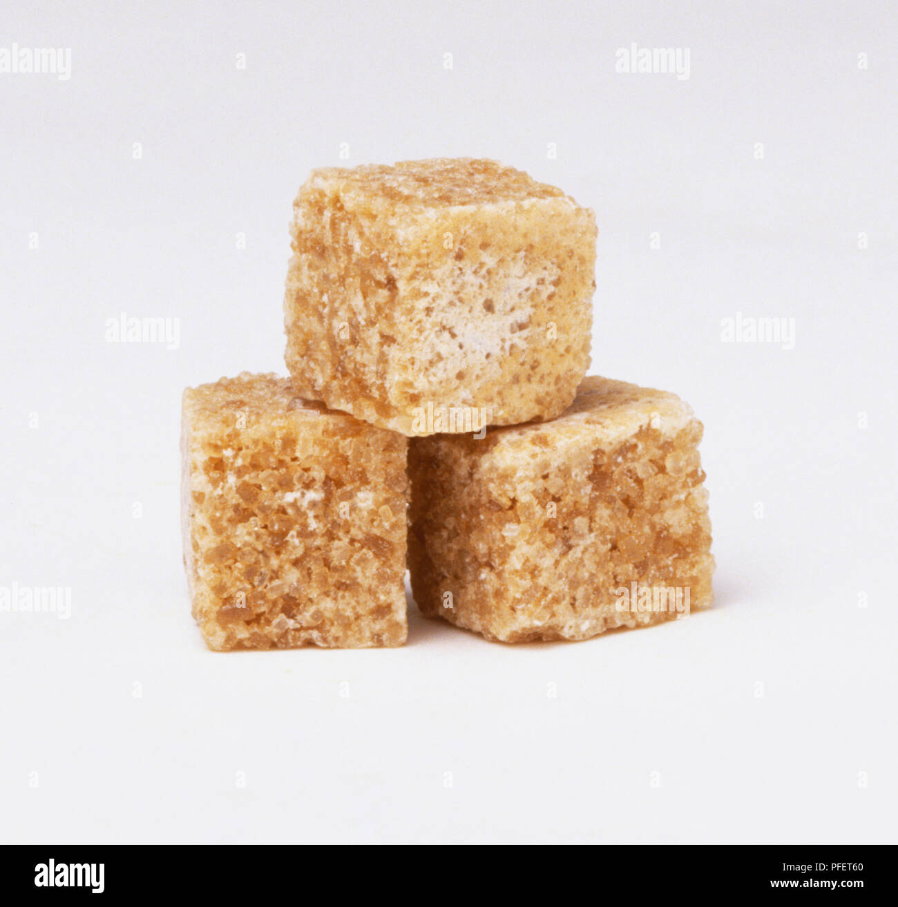 THREE LUMPS OF BROWN SUGAR Stock Photo