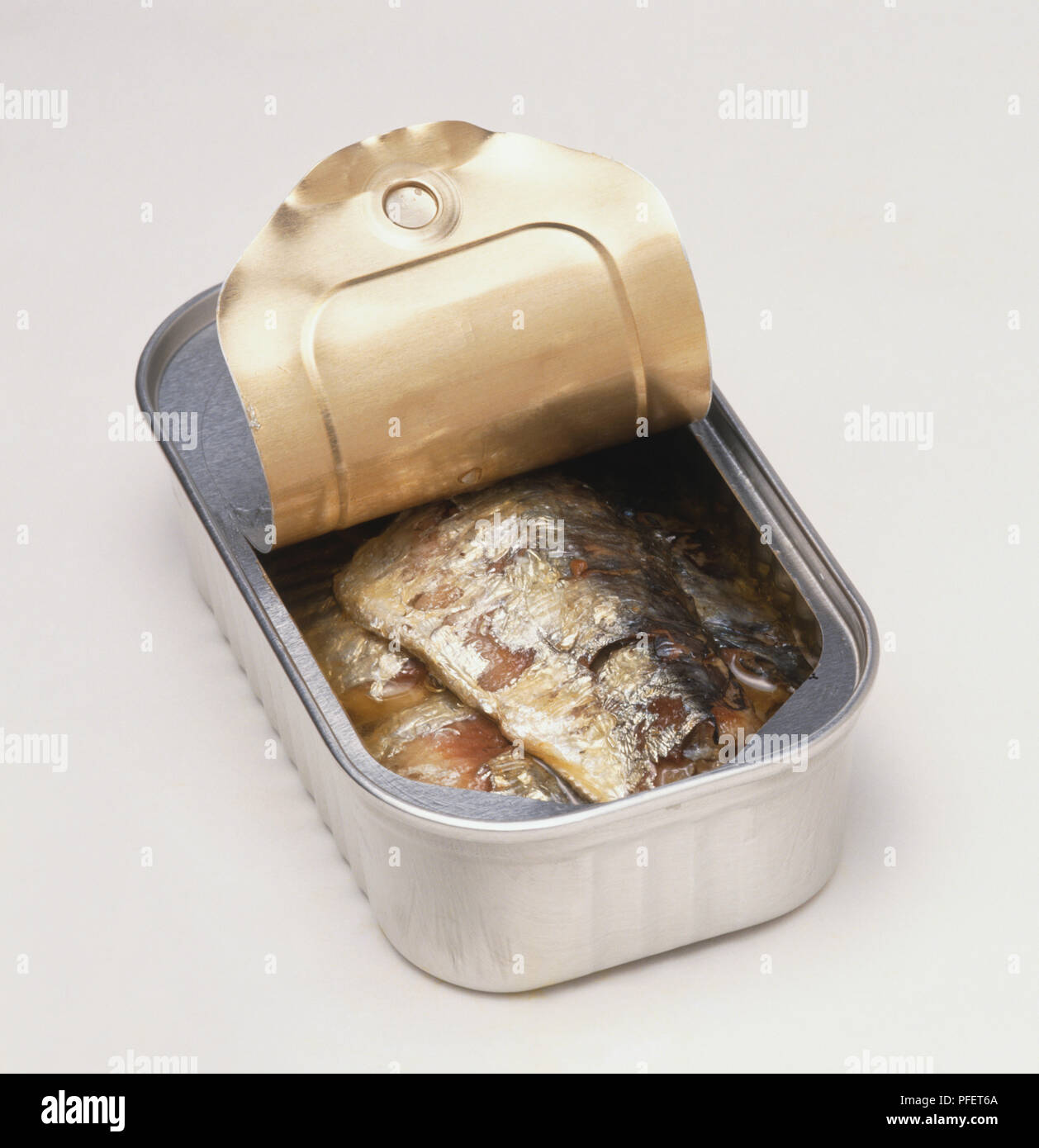 Open tin of Sardines Stock Photo - Alamy