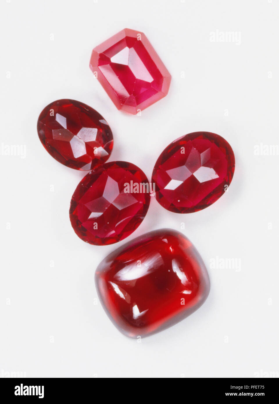 Five polished ruby gemstones Stock Photo