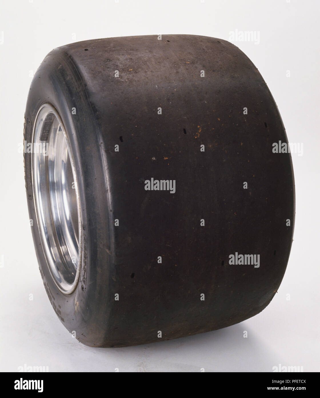 A wide racing car tyre known as Slicks. Stock Photo