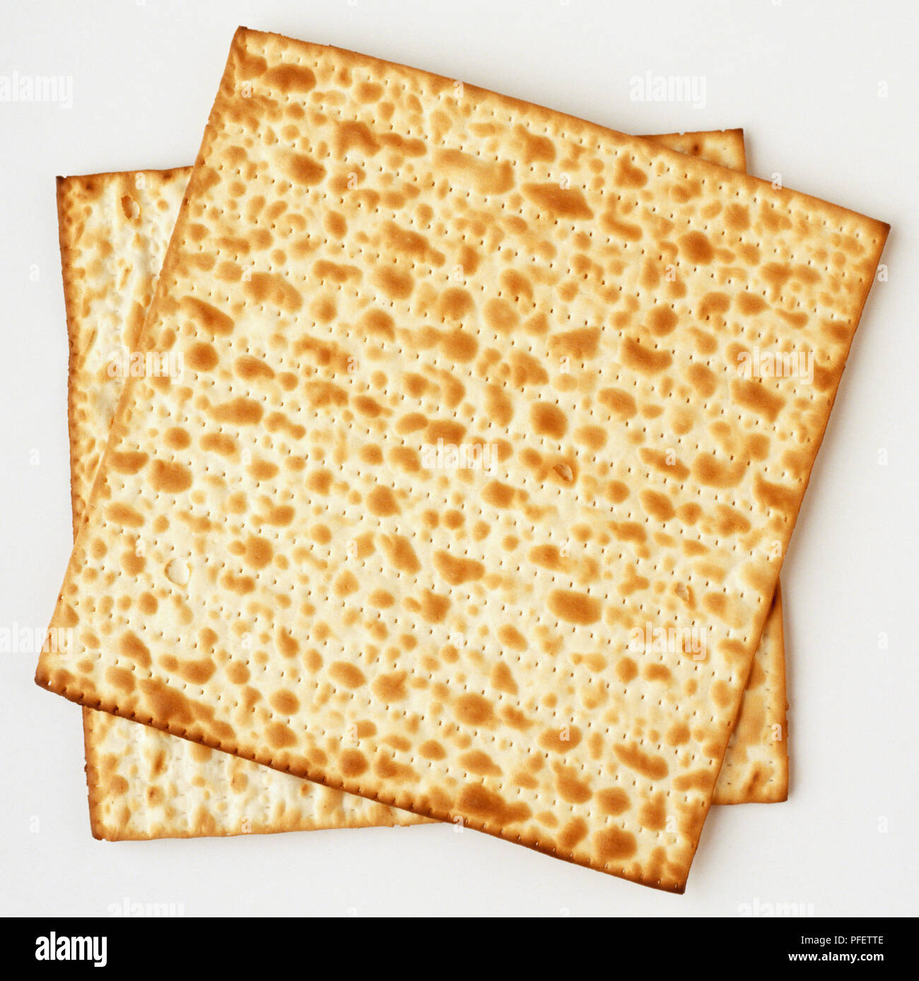 Two square matzo crackers Stock Photo Alamy